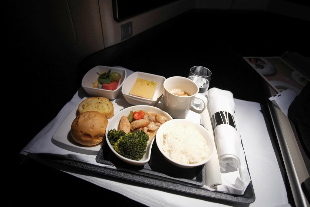 Stir fried chicken with picked young ginger meal on the Cathay Pacific A350-900 flight.