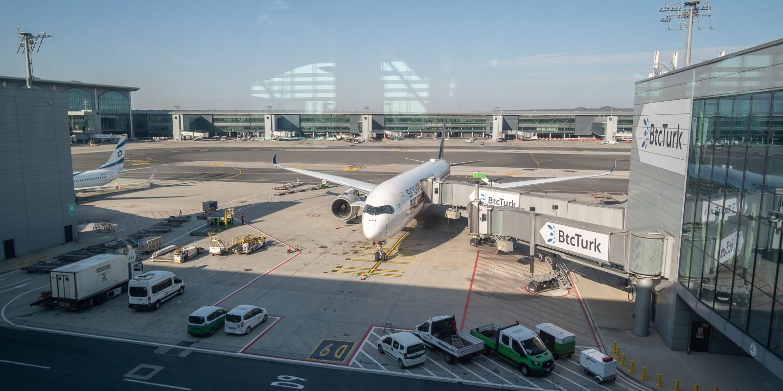 Singapore Airlines A350-900 plane docked by the air bridge