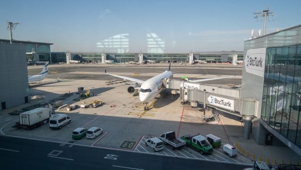 Singapore Airlines A350-900 plane docked by the air bridge