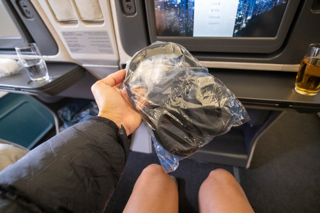 Noise cancelling headphones on the Cathay Pacific business class flight.