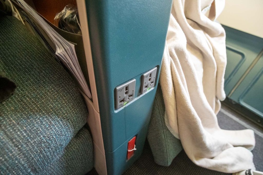 Charging ports between the seats.