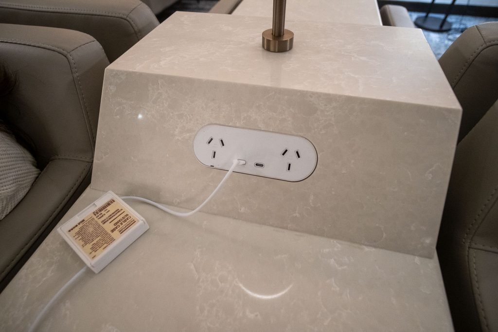 Modern charging ports in the SilverKris Lounge.