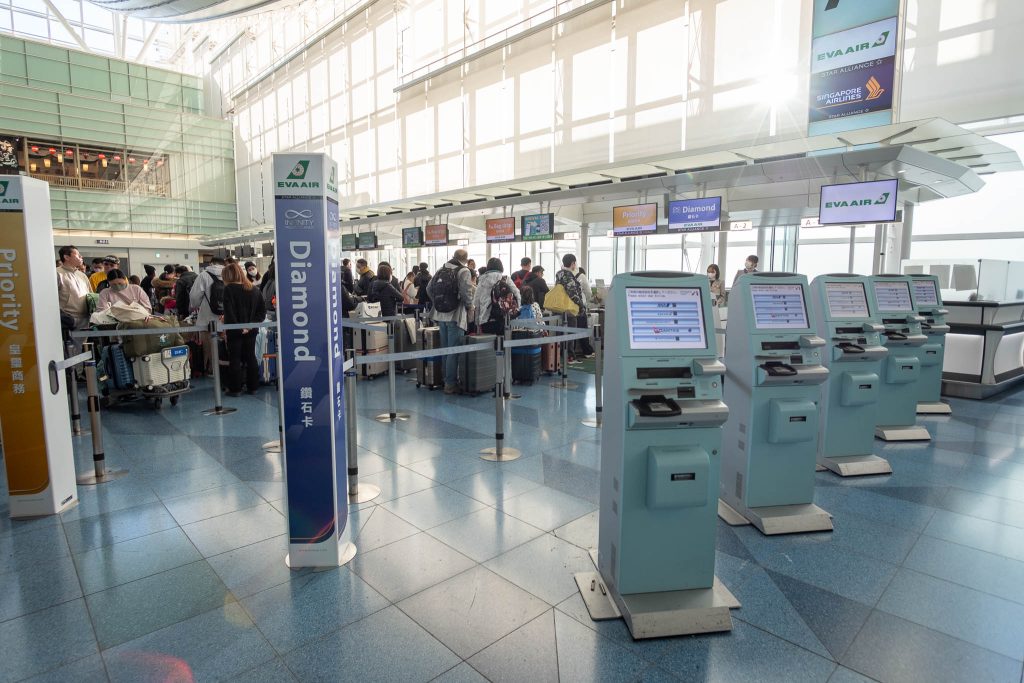 A long queue for check in at Haneda Airport.